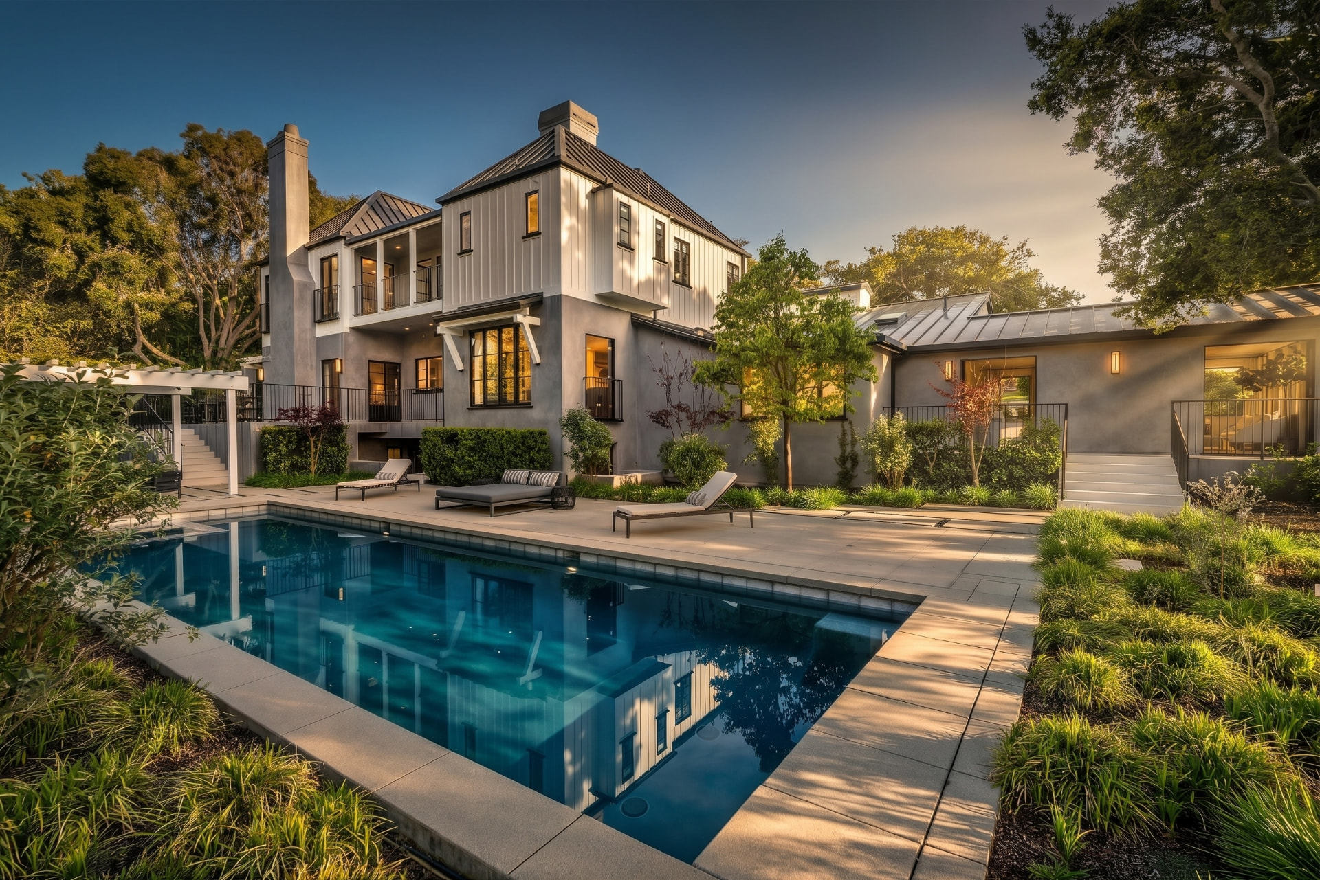 Luxury home and pool photographed at golden hour